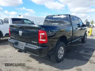 2024 Ram 2500 Laramie with VIN 3C6UR5NL2RG161490, listed as a IAAI auction lot 41688136 with 10,597 mi miles and . Bid and sale history available at DreamBid. Image 4.