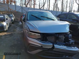 2023 Volkswagen Tiguan SE with VIN 3VVMB7AX7PM017807, listed as a IAAI auction lot 41422055 with 23,974 mi miles and . Bid and sale history available at DreamBid. Image 22.
