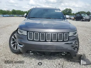 2017 Jeep Grand Cherokee Overland z VIN 1C4RJFCG1HC684826, wystawiony jako Copart lot #59971595 z przebiegiem 101 765 mil mil oraz Szkoda całkowita • Salvage title. Historia ofert i sprzedaży dostępna na DreamBid. Obrazek 5.
