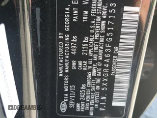 2015 Kia Optima SX Turbo with VIN 5XXGR4A63FG517153, listed as a Copart auction lot 65068985 with 153,482 mi miles and Salvage title. Bid and sale history available at DreamBid. Image 12.