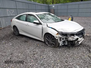 2019 Honda Civic EX z VIN 19XFC1F35KE200536, wystawiony jako IAAI lot #42198146 z przebiegiem 7 231 mil mil oraz . Historia ofert i sprzedaży dostępna na DreamBid. Obrazek 1.