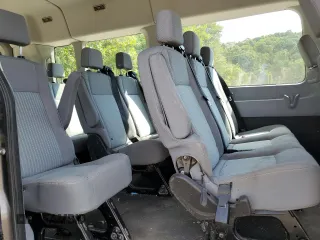 2018 Ford Transit Passenger XL with VIN 1FBAX2CG4JKB49963, listed as a Copart auction lot 69033884 with 205,105 mi miles and Salvage Title. Bid and sale history available at carsss.com. Image 11.