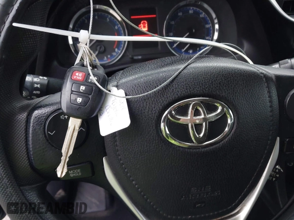 2018 Toyota Corolla L z VIN 5YFBURHE7JP831763, wystawiony jako IAAI lot #41539485 z przebiegiem 95 495 mil mil oraz . Historia ofert i sprzedaży dostępna na DreamBid. Obrazek 11.