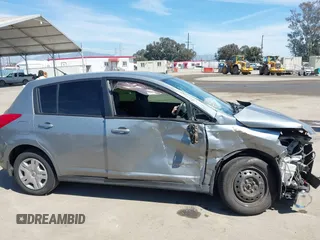 2011 Nissan Versa 1.8 S with VIN 3N1BC1CP5BL449570, listed as a IAAI auction lot 41884360 with 121,981 mi miles. Bid and sale history available at carsss.com. Image 13.