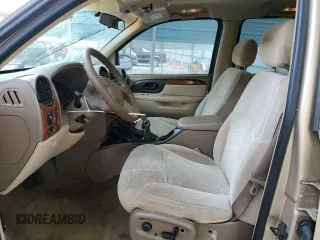 2004 Isuzu Ascender S z VIN 4NUES16S046128079, wystawiony jako Copart lot #75871464 z przebiegiem 248 013 mil mil oraz Szkody całkowita. Historia ofert i sprzedaży dostępna na DreamBid. Obrazek 7.
