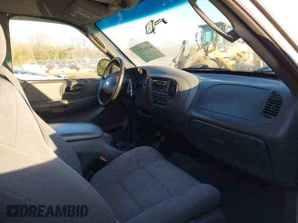 2003 Ford F-150 z VIN 2FTRX08W63CA22223, wystawiony jako IAAI lot #41382377 z przebiegiem 261 841 mil mil oraz . Historia ofert i sprzedaży dostępna na DreamBid. Obrazek 5.