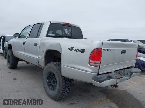 2004 Dodge Dakota Sport with VIN 1D7HG38NX4S608298, listed as a IAAI auction lot 41621473 with 192,876 mi miles. Bid and sale history available at carsss.com. Image 3.