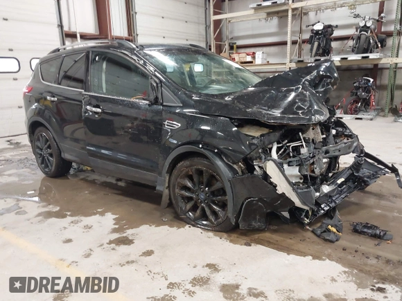 2015 Ford Escape SE with VIN 1FMCU9G91FUC49902, listed as a IAAI auction lot 41947883 with 140,670 mi miles. Bid and sale history available at carsss.com. Image 1.