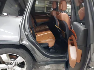2013 Jeep Grand Cherokee Overland with VIN 1C4RJFCT9DC524605, listed as a IAAI auction lot 42016103 with 215,352 mi miles. Bid and sale history available at carsss.com. Image 8.
