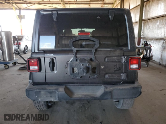 2021 Jeep Wrangler Unlimited Freedom with VIN 1C4HJXDG0MW648666, listed as a Copart auction lot 84260174 with 39,021 mi miles and Salvage title. Bid and sale history available at DreamBid. Image 6.