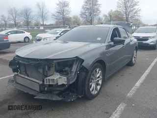 2023 Acura TLX z VIN 19UUB5F30PA006879, wystawiony jako IAAI lot #42006899 z przebiegiem 35 379 mil mil oraz . Historia ofert i sprzedaży dostępna na DreamBid. Obrazek 6.