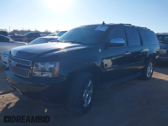 2008 Chevrolet Suburban LTZ with VIN 3GNFK16338G304546, listed as a IAAI auction lot 41404453 with 174,443 mi miles. Bid and sale history available at carsss.com. Image 2.