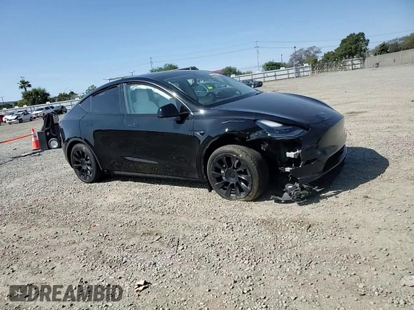 2023 Tesla Model Y Long Range with VIN 7SAYGAEE0PF642810, listed as a Copart auction lot 52181655 with 74,922 mi miles and Salvage Title. Bid and sale history available at DreamBid. Image 10.
