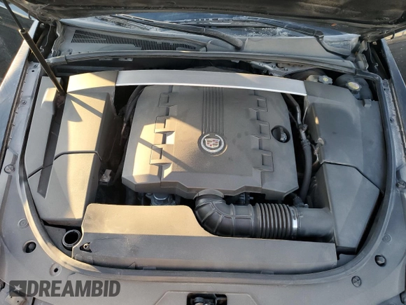 2012 Cadillac CTS Premium с VIN 1G6DP5E39C0103583, выставлен на аукционе Copart как лот 84482794 с пробегом 176 233 миль миль и Списание • Salvage title. История ставок и продаж доступна на DreamBid. Изображение 12.