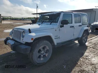 2016 Jeep Wrangler Unlimited Sahara with VIN 1C4BJWEG6GL301301, listed as a Copart auction lot 54362595 with 110,295 mi miles and Salvage title. Bid and sale history available at DreamBid. Image 1.