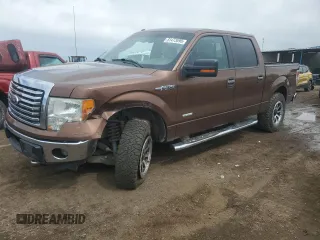 2011 Ford F-150 XLT with VIN 1FTFW1ETXBFB51042, listed as a Copart auction lot 51473695 with 179,195 mi miles and Salvage Title. Bid and sale history available at carsss.com. Image 1.