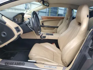 2007 Aston Martin DB9 z VIN SCFAD01A77GA07808, wystawiony jako Copart lot #48063115 z przebiegiem 53 195 mil mil oraz Szkody całkowita. Historia ofert i sprzedaży dostępna na DreamBid. Obrazek 7.