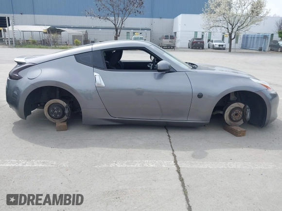 2012 Nissan 370Z Touring with VIN JN1AZ4EH4CM561415, listed as a IAAI auction lot 41838948 with 111,298 mi miles. Bid and sale history available at carsss.com. Image 13.