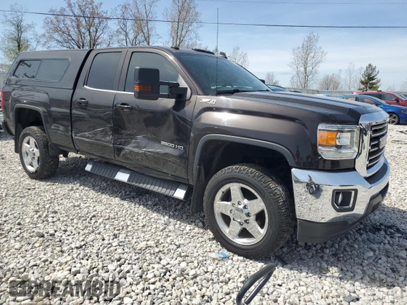 2018 GMC Sierra 2500HD SLE z VIN 1GT22SEG9JZ321603, wystawiony jako Copart lot #54608685 z przebiegiem 79 638 mil mil oraz Czysty tytuł • Clean title. Historia ofert i sprzedaży dostępna na DreamBid. Obrazek 4.