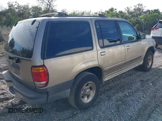 1999 Ford Explorer z VIN 1FMZU32X7XUB01672, wystawiony jako IAAI lot #41263264 z przebiegiem 148 134 mil mil oraz . Historia ofert i sprzedaży dostępna na DreamBid. Obrazek 4.