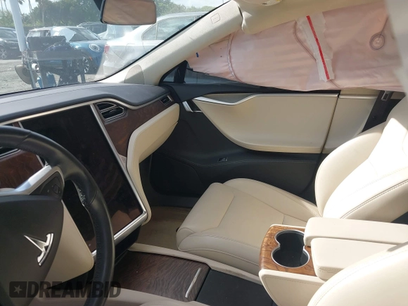 2017 Tesla Model S 100D with VIN 5YJSA1E28HF217489, listed as a IAAI auction lot 42128388 with Not provided miles and . Bid and sale history available at DreamBid. Image 5.