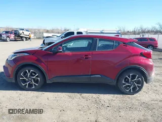 2018 Toyota C-HR XLE z VIN NMTKHMBX5JR051056, wystawiony jako IAAI lot #41740517 z przebiegiem 80 368 mil mil oraz . Historia ofert i sprzedaży dostępna na DreamBid. Obrazek 14.
