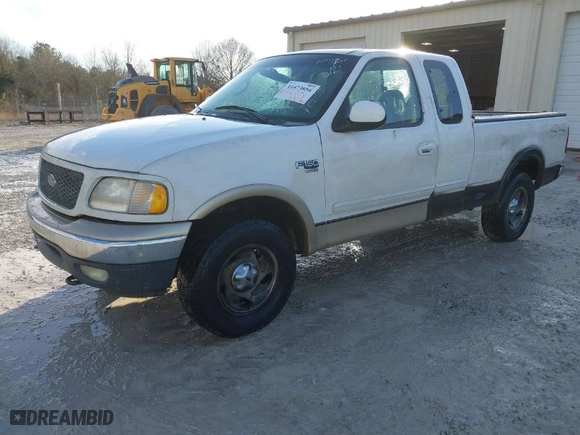 2000 Ford F-150 Work Series with VIN 2FTRX18W1YCA08159, listed as a IAAI auction lot 41473856 with 265,546 mi miles. Bid and sale history available at carsss.com. Image 2.