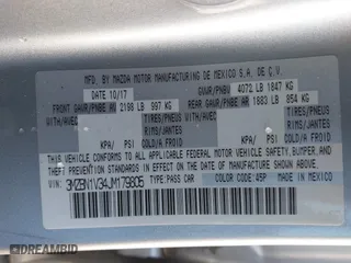 2018 Mazda Mazda3 4-Door Touring with VIN 3MZBN1V34JM179805, listed as a IAAI auction lot 41734757 with 59,468 mi miles. Bid and sale history available at carsss.com. Image 9.