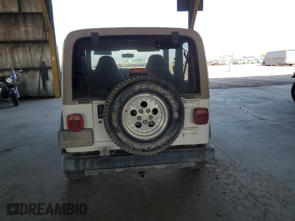 1999 Jeep Wrangler Sport с VIN 1J4FY19S9XP414239, выставлен на аукционе Copart как лот 66882505 с пробегом 131 916 миль миль и Чистый • Clean title. История ставок и продаж доступна на DreamBid. Изображение 6.