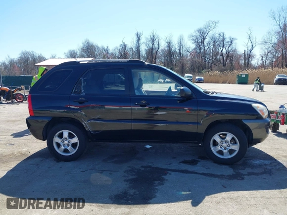 2007 Kia Sportage LX with VIN KNDJF724877313178, listed as a IAAI auction lot 41863492 with 199,138 mi miles. Bid and sale history available at carsss.com. Image 13.