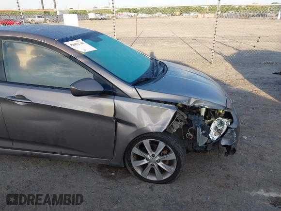 2012 Hyundai Accent GLS with VIN KMHCU4AE4CU097425, listed as a IAAI auction lot 42052740 with 244,705 mi miles. Bid and sale history available at carsss.com. Image 12.