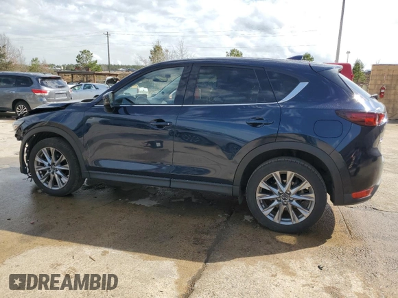 2021 Mazda CX-5 Grand Touring with VIN JM3KFBDM8M0489180, listed as a Copart auction lot 49900525 with 34,687 mi miles and Salvage Title. Bid and sale history available at carsss.com. Image 2.