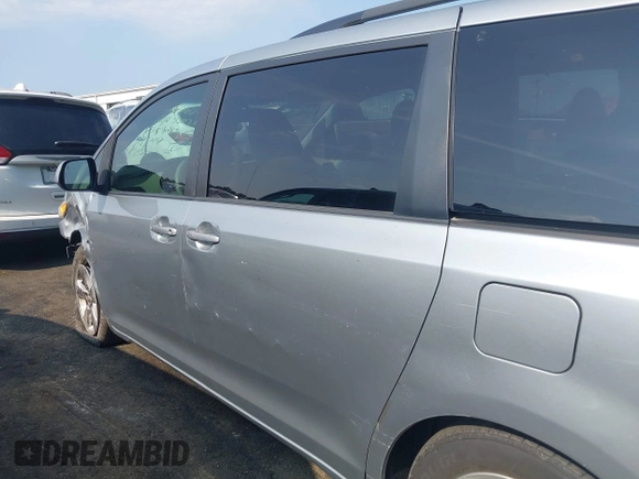 2013 Toyota Sienna LE AAS with VIN 5TDKK3DC2DS389557, listed as a IAAI auction lot 42589108 with 205,115 mi miles and . Bid and sale history available at DreamBid. Image 14.