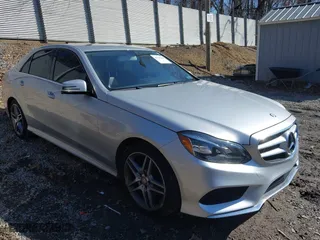 2014 Mercedes-Benz E-Class E 350 Luxury with VIN WDDHF8JB2EA891237, listed as a IAAI auction lot 41725010 with 115,429 mi miles. Bid and sale history available at carsss.com. Image 1.