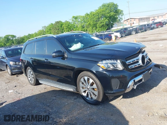 2018 Mercedes-Benz GLS 450 with VIN 4JGDF6EE1JB075332, listed as a IAAI auction lot 42120007 with 111,559 mi miles and . Bid and sale history available at DreamBid. Image 13.