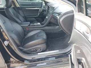 2017 Ford Fusion Titanium with VIN 3FA6P0K91HR257462, listed as a IAAI auction lot 42079361 with 124,914 mi miles and . Bid and sale history available at DreamBid. Image 5.