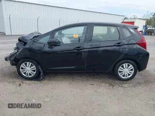 2016 Honda Fit LX with VIN JHMGK5H5XGX019435, listed as a IAAI auction lot 42009756 with 71,757 mi miles and . Bid and sale history available at DreamBid. Image 14.