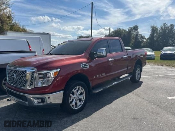 2016 Nissan Titan Platinum Reserve z VIN 1N6BA1F26GN512666, wystawiony jako Copart lot #84673544 z przebiegiem 120 182 mil mil oraz Czysty tytuł • Clean title. Historia ofert i sprzedaży dostępna na DreamBid. Obrazek 2.