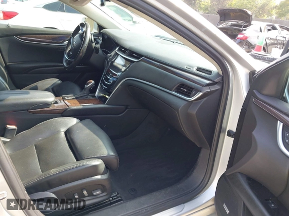 2014 Cadillac XTS Luxury with VIN 2G61N5S30E9294994, listed as a IAAI auction lot 42617654 with 159,573 mi miles and . Bid and sale history available at DreamBid. Image 5.