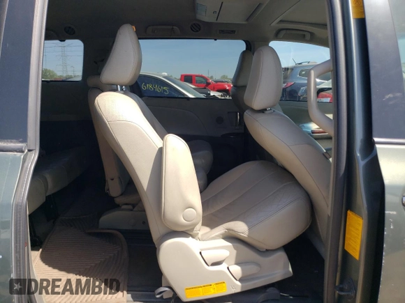 2013 Toyota Sienna XLE AAS с VIN 5TDYK3DC2DS313685, выставлен на аукционе Copart как лот 56064505 с пробегом 115 624 миль миль и Списание • Salvage title. История ставок и продаж доступна на DreamBid. Изображение 11.