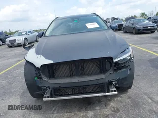2022 Volvo XC60 Momentum z VIN YV4L12RKXN1052826, wystawiony jako IAAI lot #41869228 z przebiegiem 30 044 mil mil oraz . Historia ofert i sprzedaży dostępna na DreamBid. Obrazek 13.