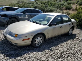 2002 Saturn SL z VIN 1G8ZH54852Z214519, wystawiony jako Copart lot #57287175 z przebiegiem 176 175 mil mil oraz Szkoda całkowita • Salvage title. Historia ofert i sprzedaży dostępna na DreamBid. Obrazek 1.