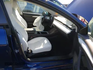 2023 Tesla Model 3 Long Range with VIN 5YJ3E1EB5PF623706, listed as a IAAI auction lot 41321269 with 21,081 mi miles and . Bid and sale history available at DreamBid. Image 5.