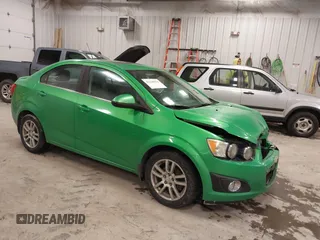 2015 Chevrolet Sonic LT with VIN 1G1JC5SB2F4118522, listed as a IAAI auction lot 41640019 with 217,102 mi miles and . Bid and sale history available at DreamBid. Image 1.
