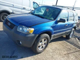 2007 Ford Escape XLT with VIN 1FMYU93137KA13657, listed as a IAAI auction lot 42060707 with 118,580 mi miles. Bid and sale history available at carsss.com. Image 2.