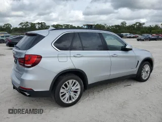 2015 BMW X5 xDrive50i with VIN 5UXKR6C51F0J74160, listed as a Copart auction lot 79337044 with 143,436 mi miles and Salvage title. Bid and sale history available at DreamBid. Image 3.