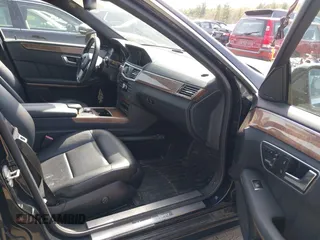 2012 Mercedes-Benz E with VIN WDDHF8JB1CA613068, listed as a IAAI auction lot 42119706 with 197,476 mi miles. Bid and sale history available at carsss.com. Image 5.