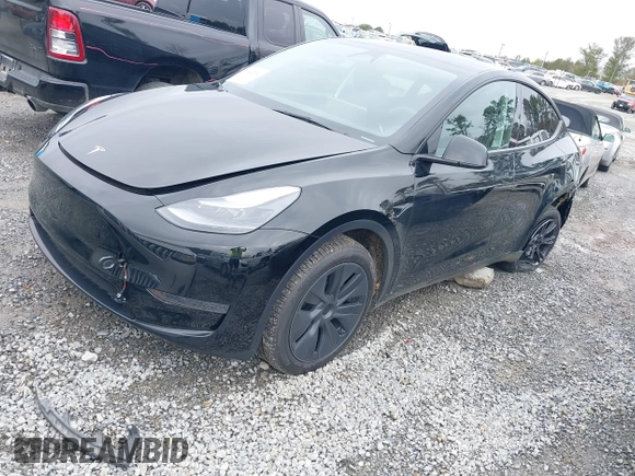 2025 Tesla Model Y Long Range with VIN 7SAYGDEDXSA349480, listed as a IAAI auction lot 41492740 with 1,486 mi miles and . Bid and sale history available at DreamBid. Image 2.
