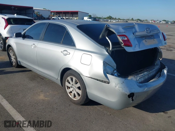 2007 Toyota Camry LE with VIN JTNBK46KX73012065, listed as a IAAI auction lot 41993858 with 318,639 mi miles and . Bid and sale history available at DreamBid. Image 3.