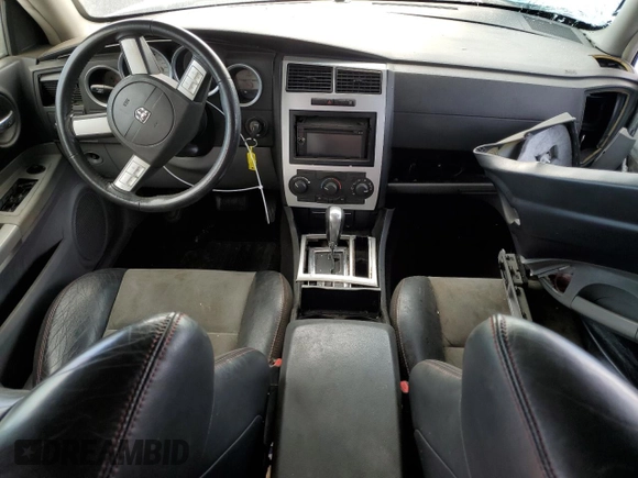 2006 Dodge Charger SRT-8 with VIN 2B3KA73W26H279925, listed as a Copart auction lot 78479574 with 127,443 mi miles and Salvage Title. Bid and sale history available at DreamBid. Image 8.